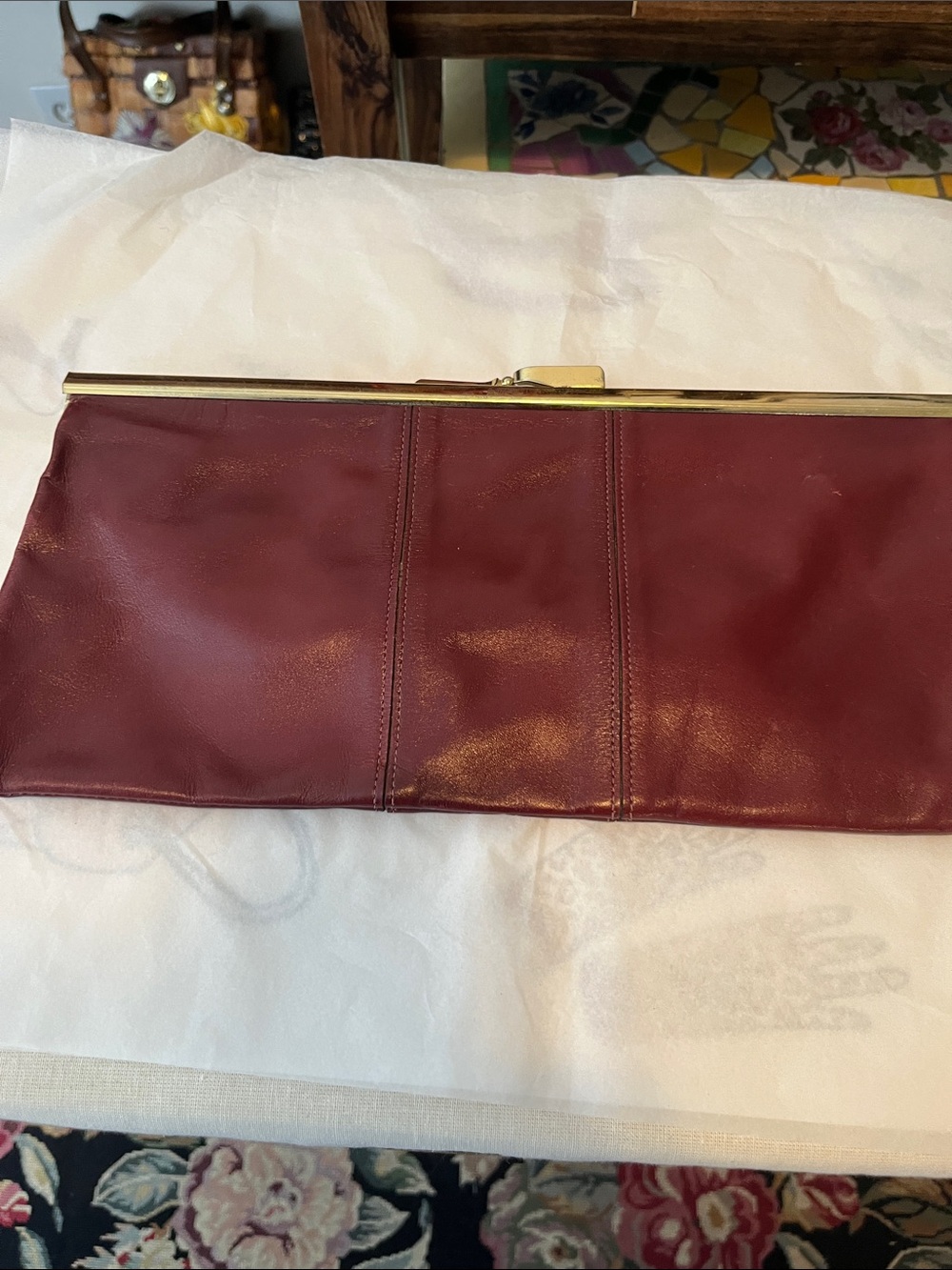 Elegant Burgundy Leather Clutch with Gold Frame